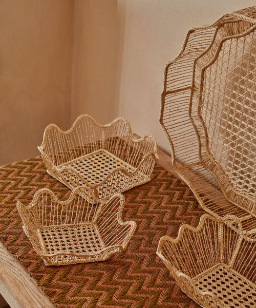 Petit Pain bread basket detail, handwoven Iraca palm with a softly waved edge