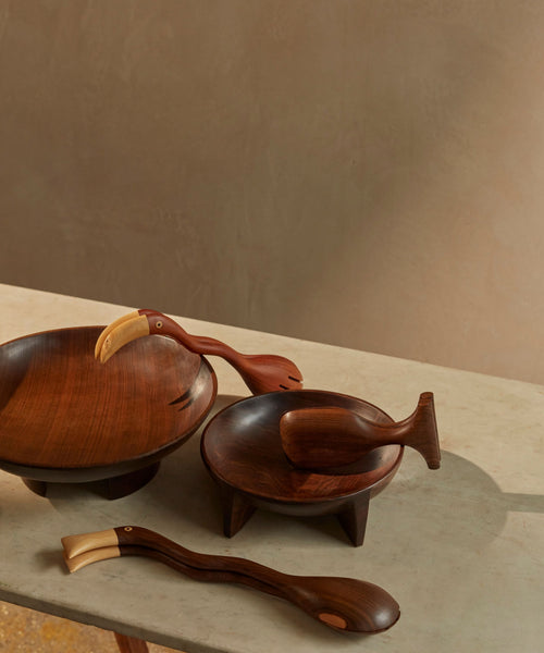 New Moon Lara bowl - crescent-carved pedestal leg detail