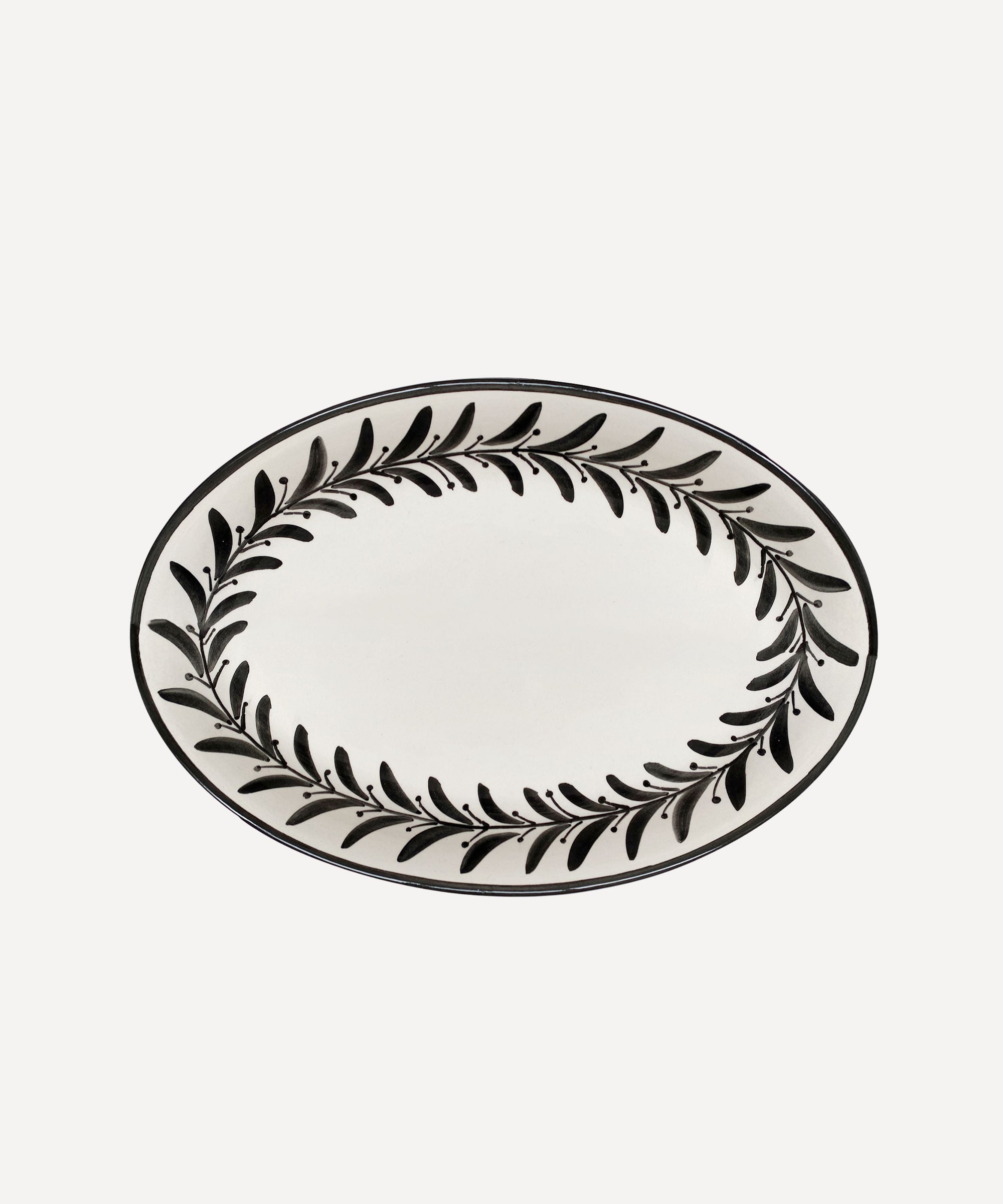 Jet Black Helecho serving platter, hand-painted fern wreath ceramic from Carmen del Viboral
