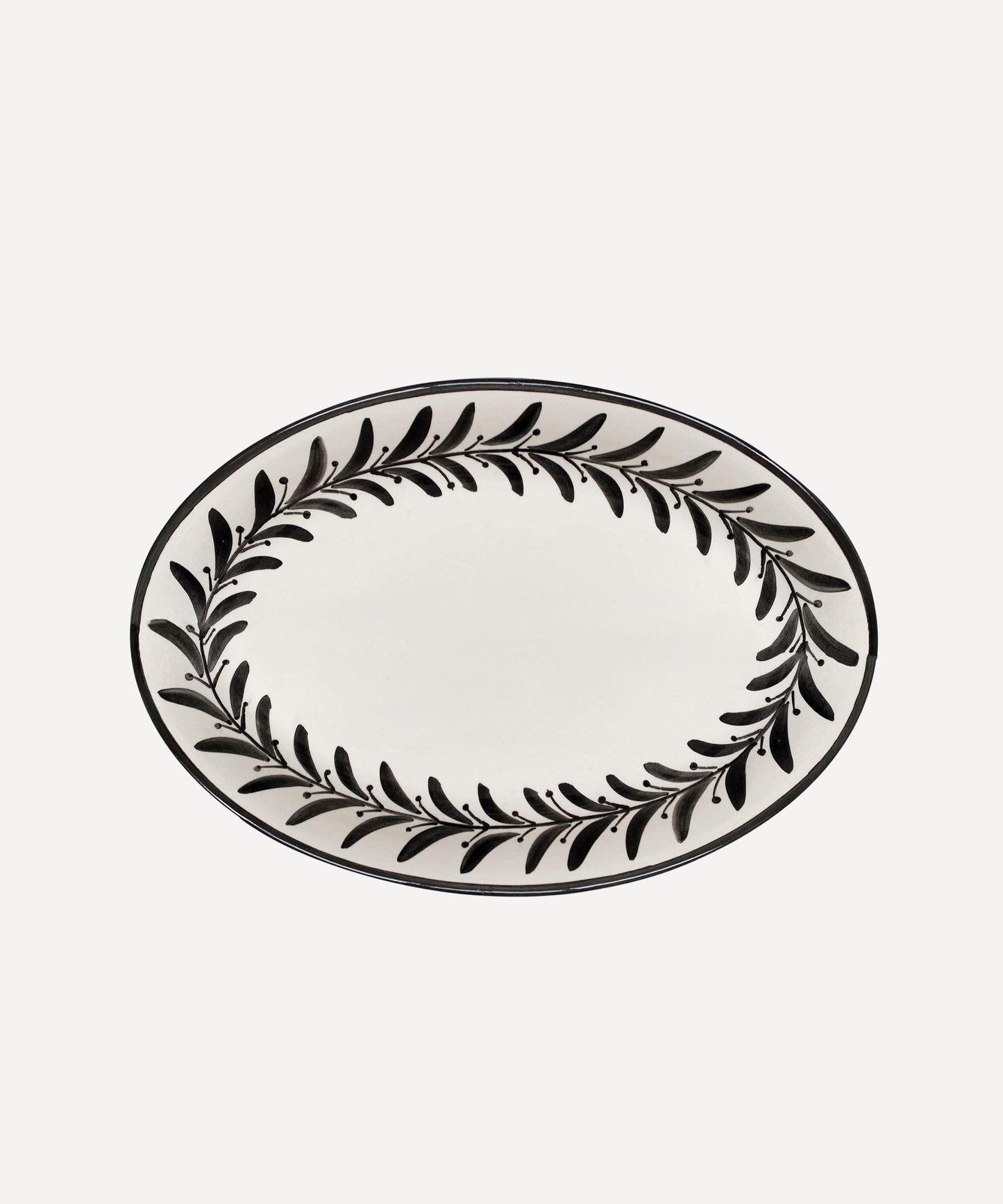 Jet Black Helecho serving platter, hand-painted fern wreath ceramic from Carmen del Viboral