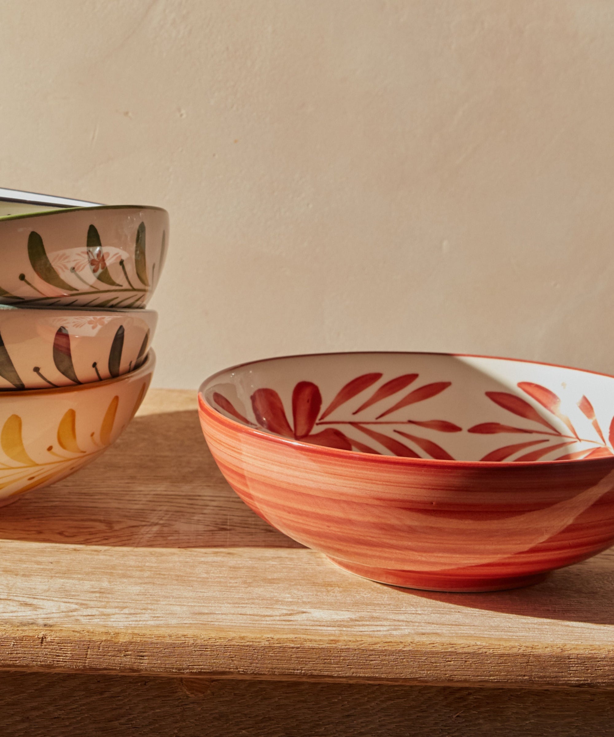 Rust Red Flor salad bowl with freehand floral motif, hand-painted ceramic
