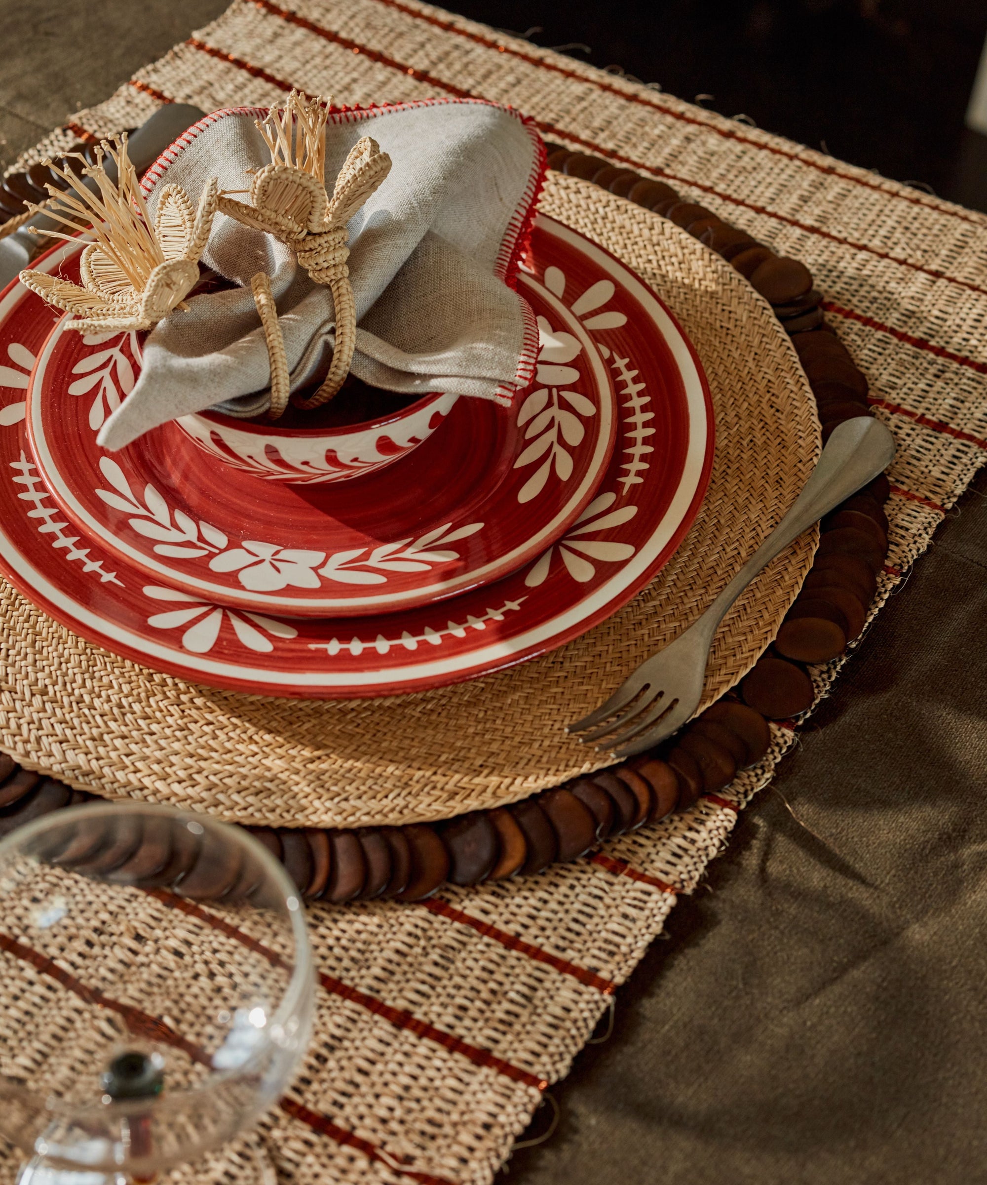 Dark Flor Side Plate in Rust Red, white floral on a deep ground — overhead view
