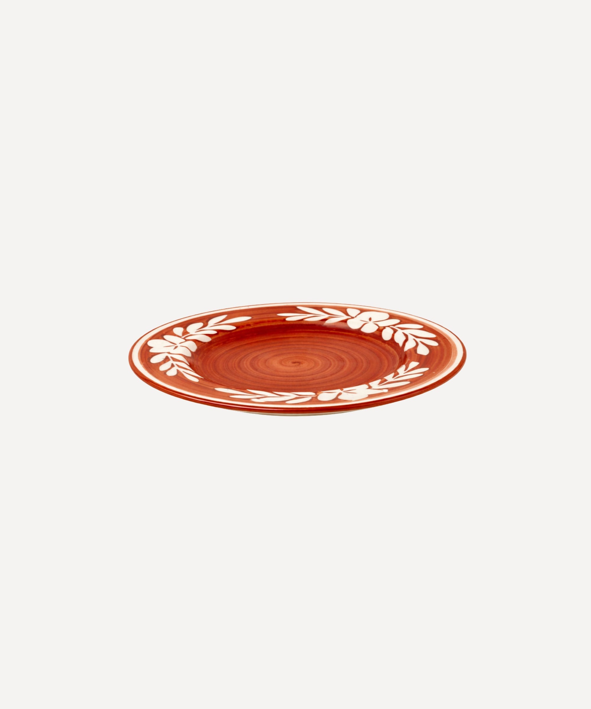 Dark Flor Side Plate in Rust Red, white floral on a deep ground — side profile