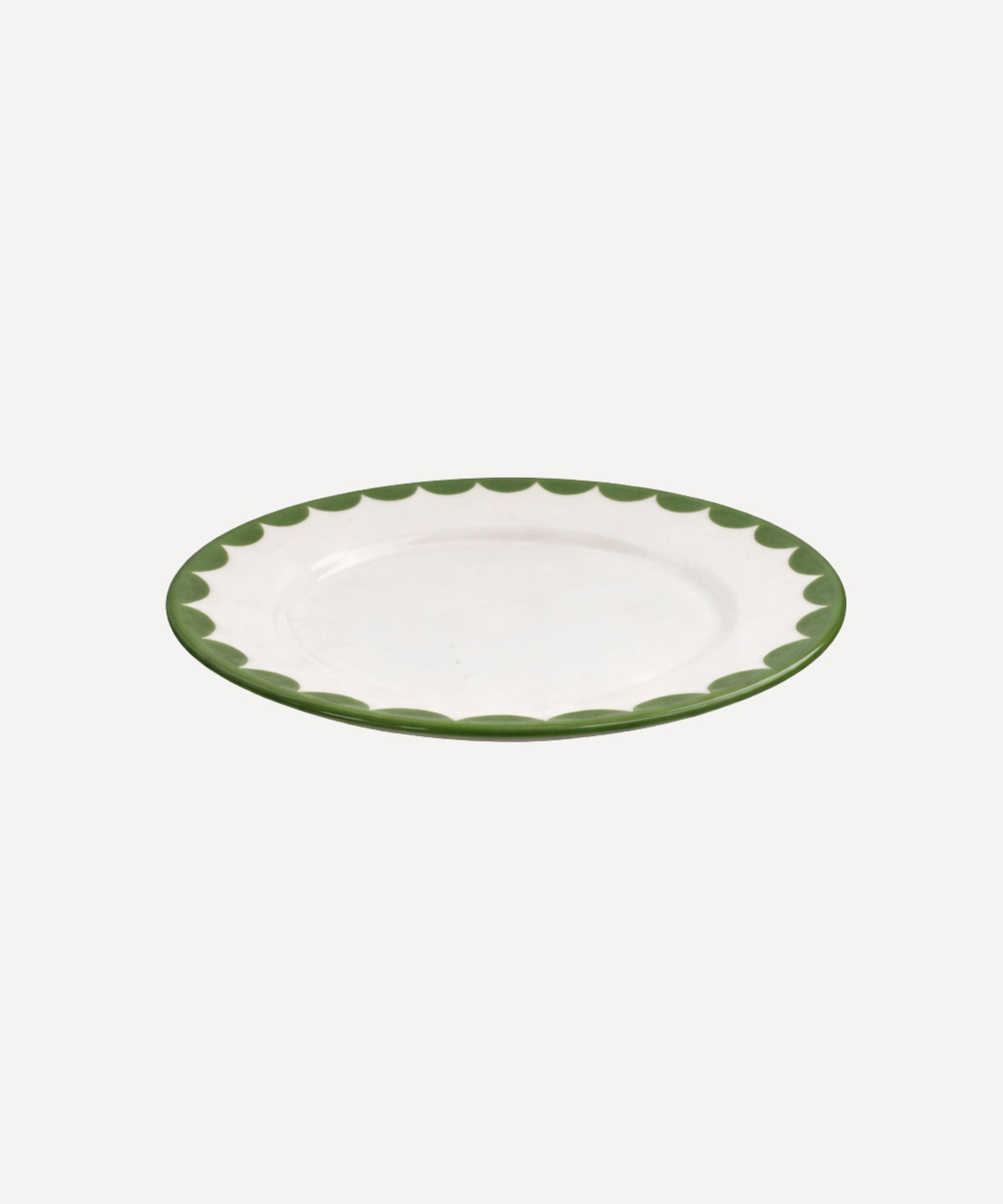 Cascos Side Plate in Fern Green, scalloped ceramic — overhead view
