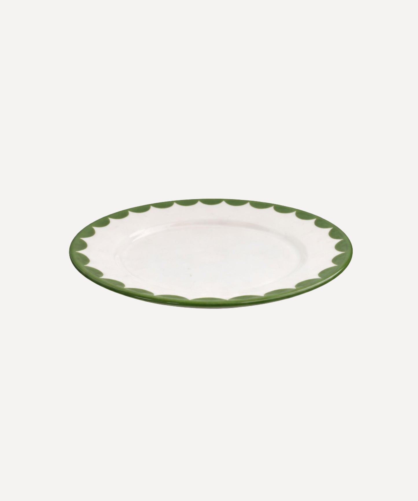 Cascos Side Plate in Fern Green, scalloped ceramic — overhead view