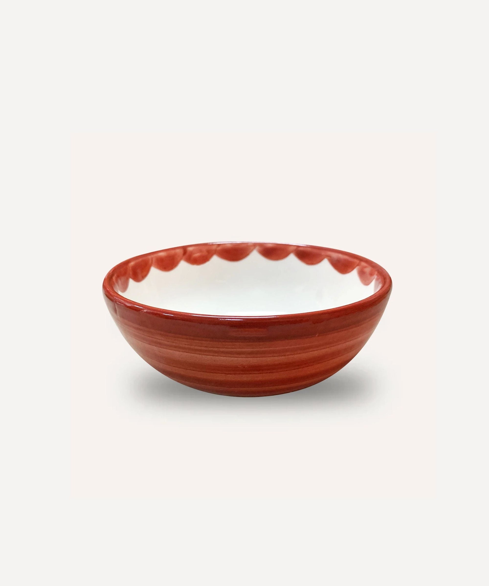 Cascos bowl in Rust Red — hand-painted scalloped ceramic, Carmen del Viboral, Colombia