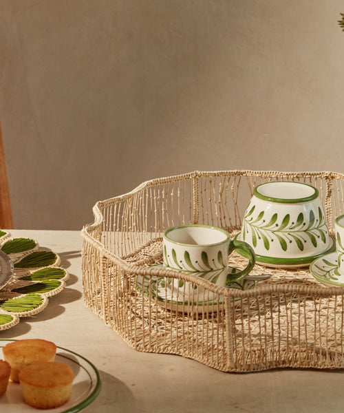 Hand-painted Helecho French butter dish in Fern Green styled in a table setting, showing the fern wreath ceramic from Carmen del Viboral, Colombia.