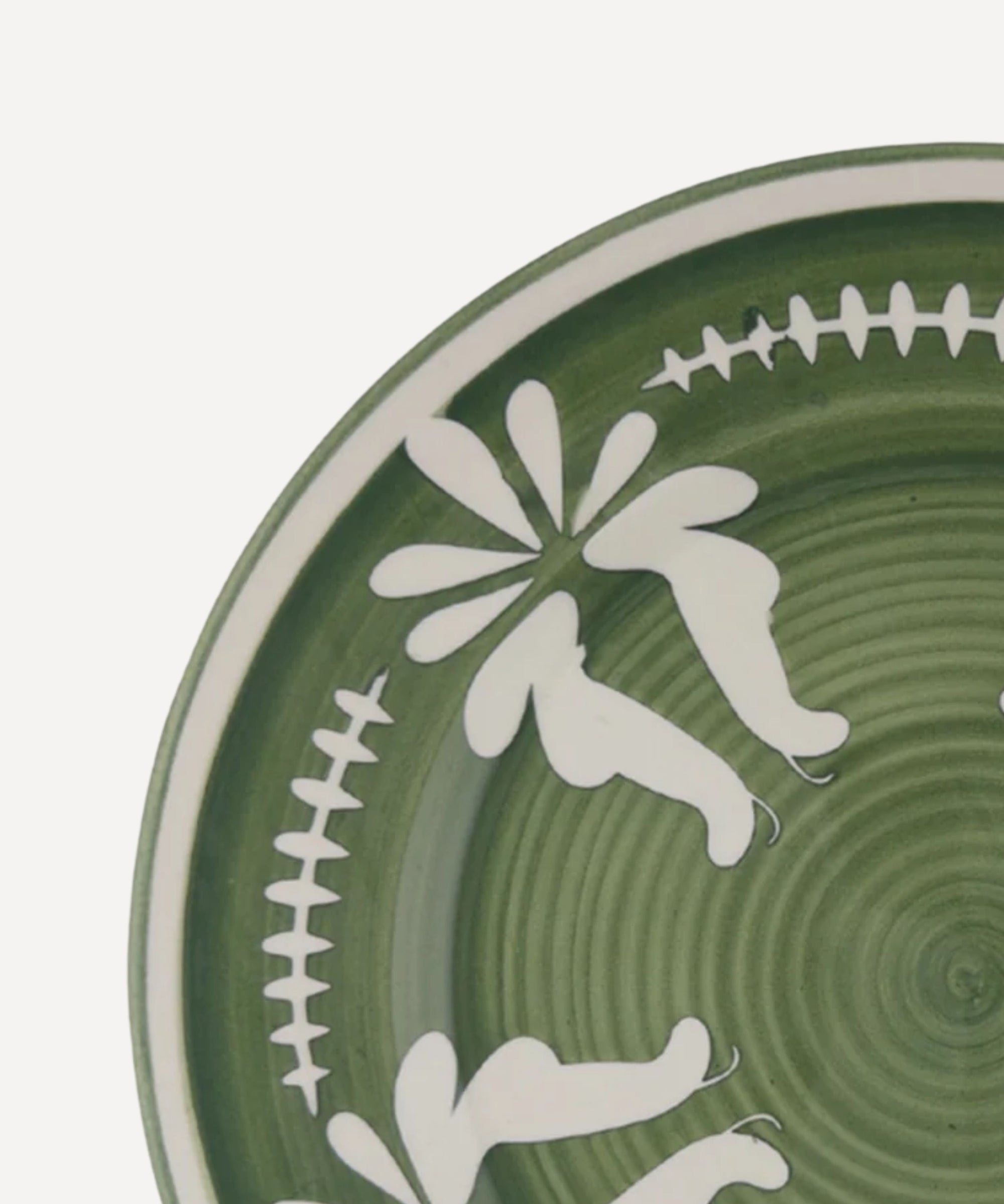 Flor Dinner Plate in Fern Green, hand-painted floral ceramic — side profile