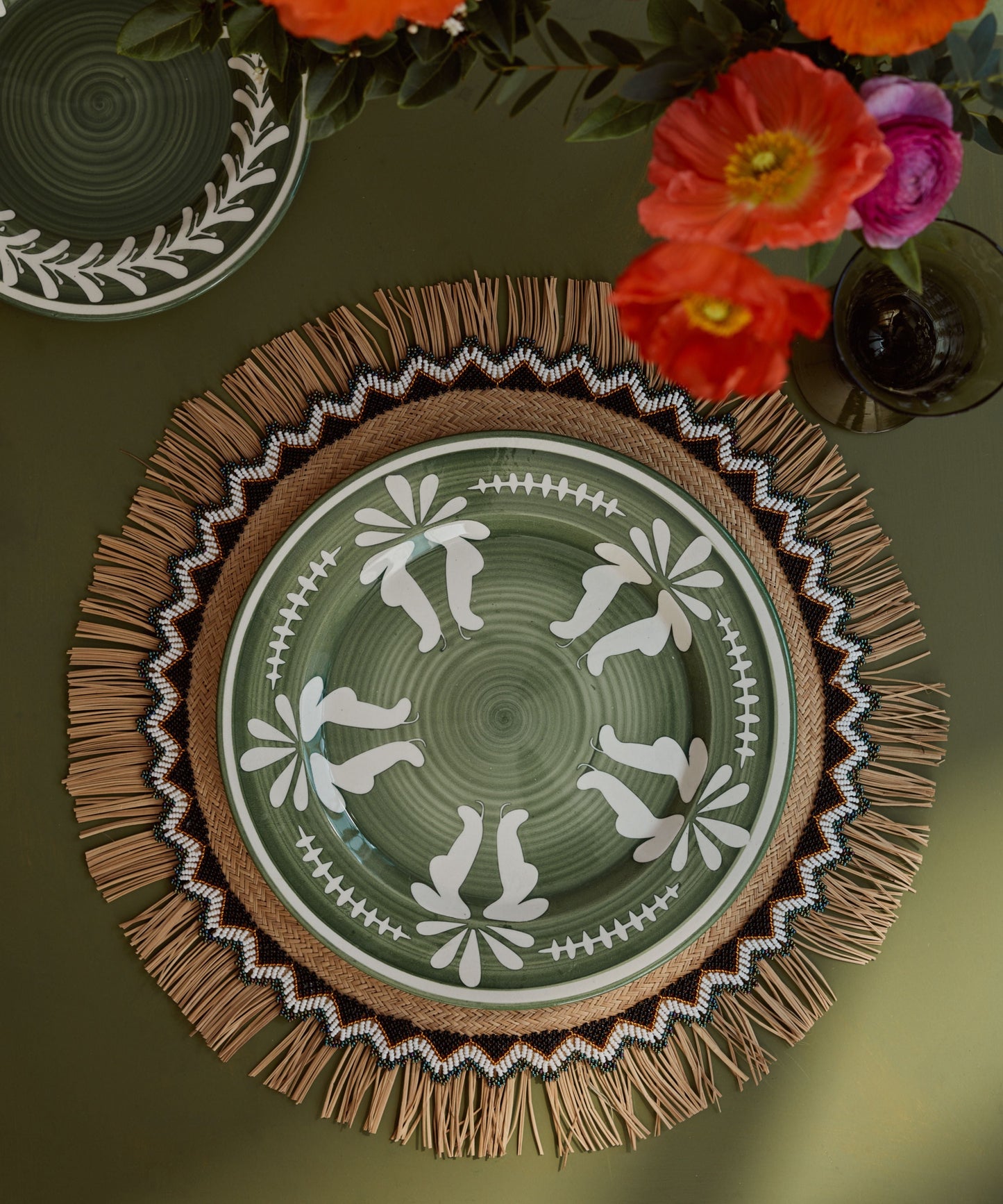Flor Dinner Plate in Fern Green — detail of the hand-painted floral motif