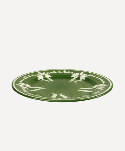Flor Dinner Plate in Fern Green, hand-painted floral ceramic — styled on a table