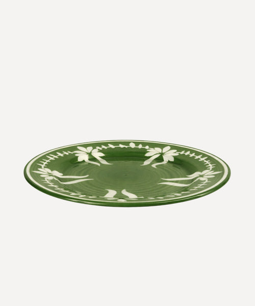 Flor Dinner Plate in Fern Green, hand-painted floral ceramic — styled on a table