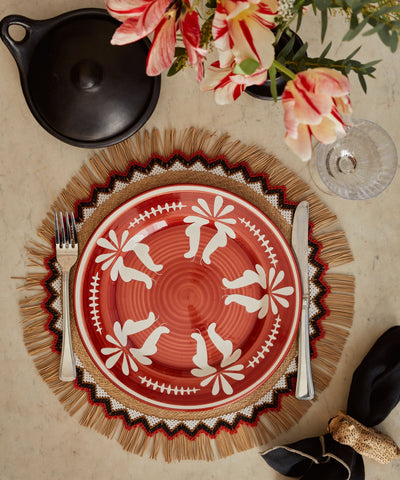 Flor Dinner Plate in Rust Red, hand-painted floral ceramic — overhead view
