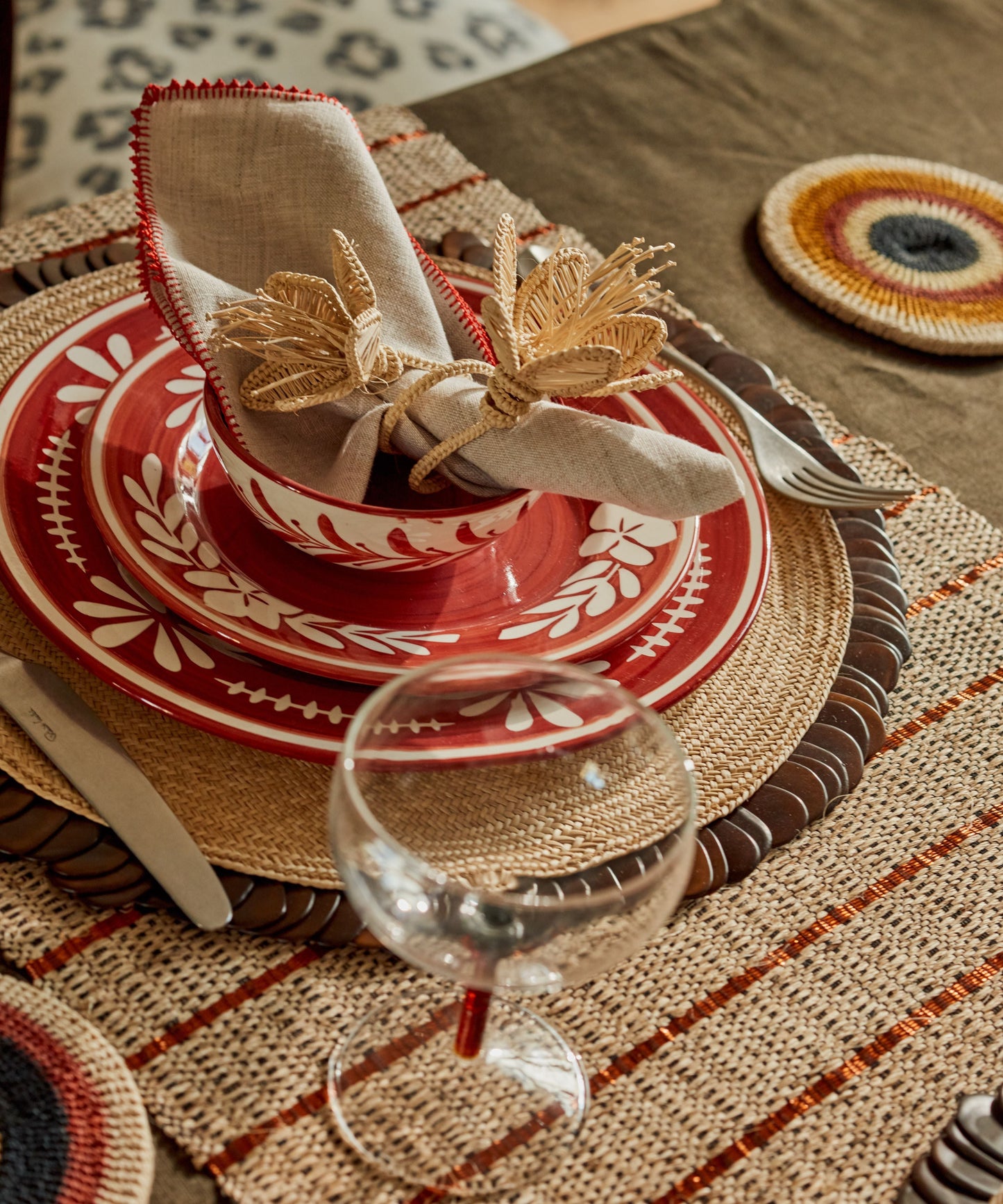 Flor Dinner Plate in Rust Red — detail of the hand-painted floral motif
