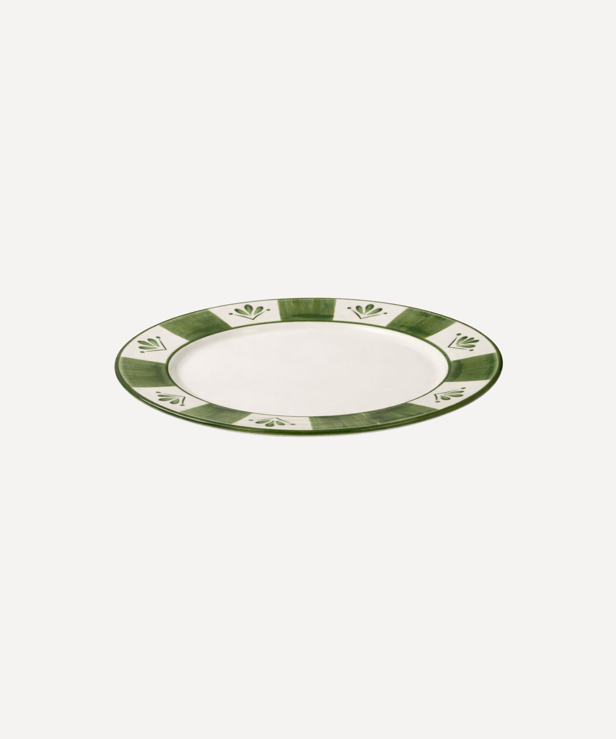 Flor de Lis Dinner Plate in Fern Green, floral ceramic — overhead view