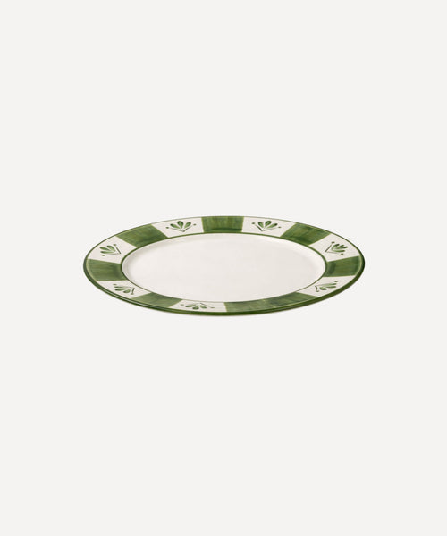 Flor de Lis Dinner Plate in Fern Green, floral ceramic — overhead view