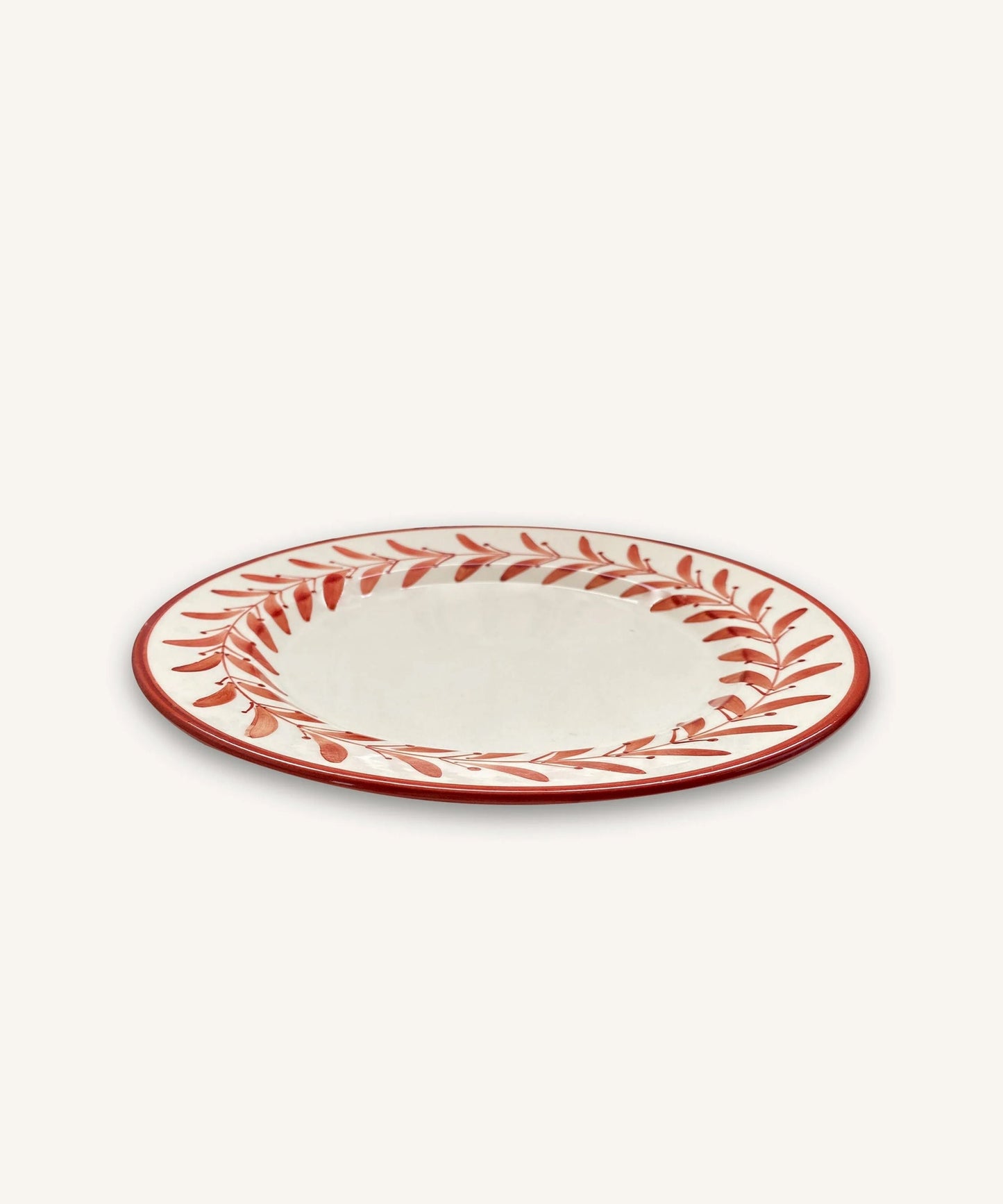Helecho Dinner Plate Rust Red top-down view — hand-painted Colombian ceramic