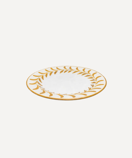 Helecho Side Plate Golden Yellow top-down view — fern wreath on white ground