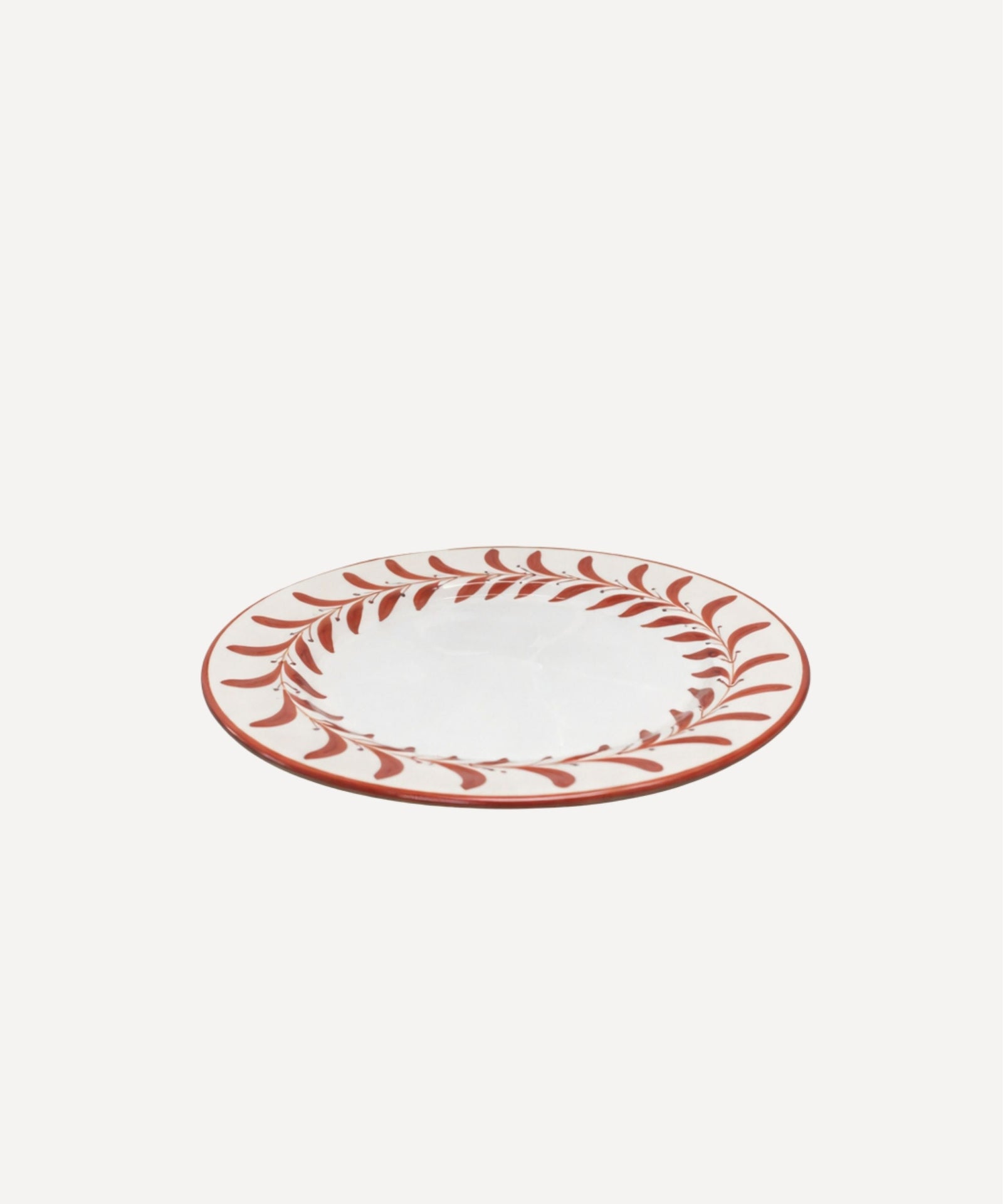 Helecho Side Plate Rust Red detail — freehand botanical fern motif, Carmen del Viboral