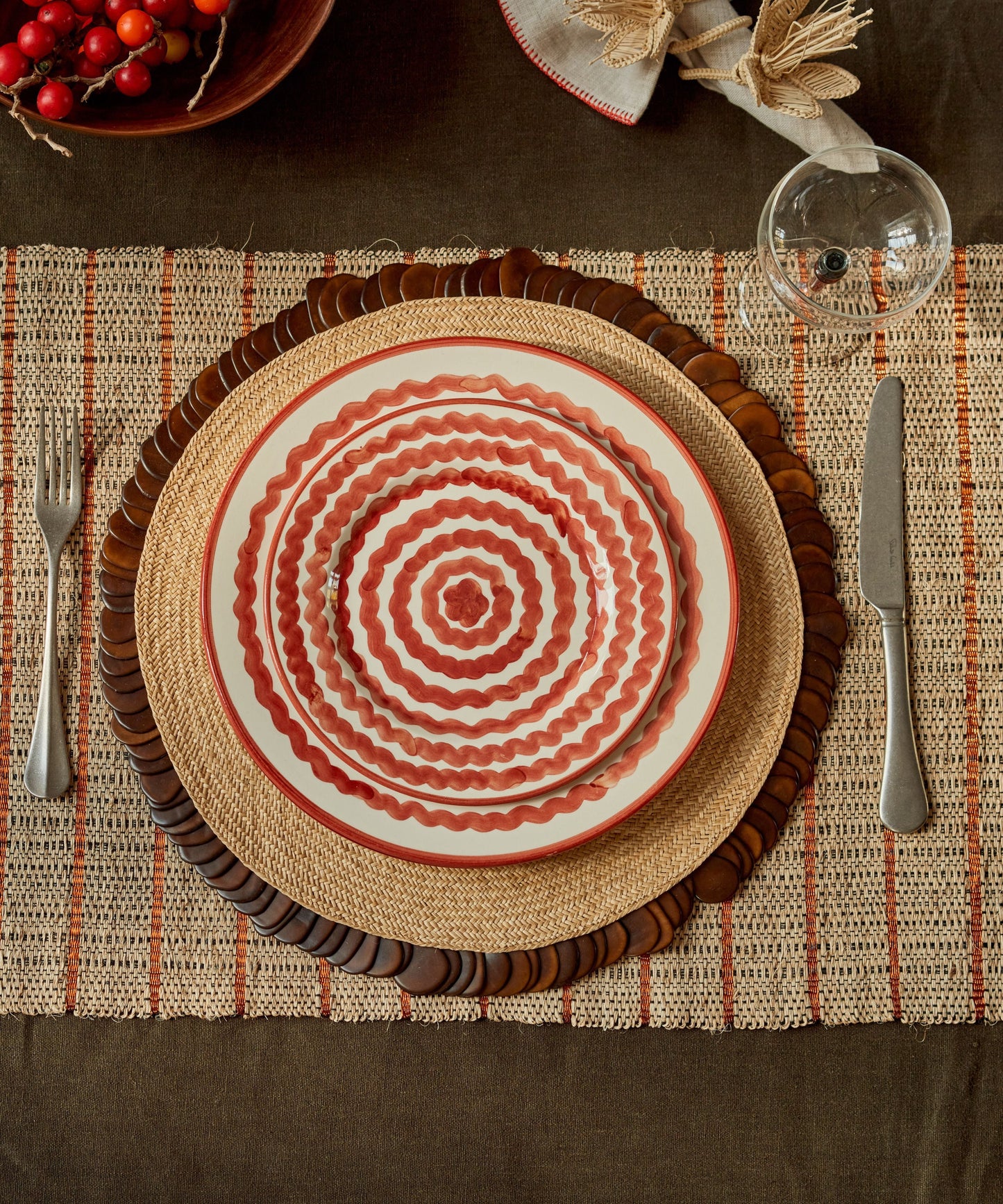 Ondas Side Plate in Rust Red — detail of the rippled circles
