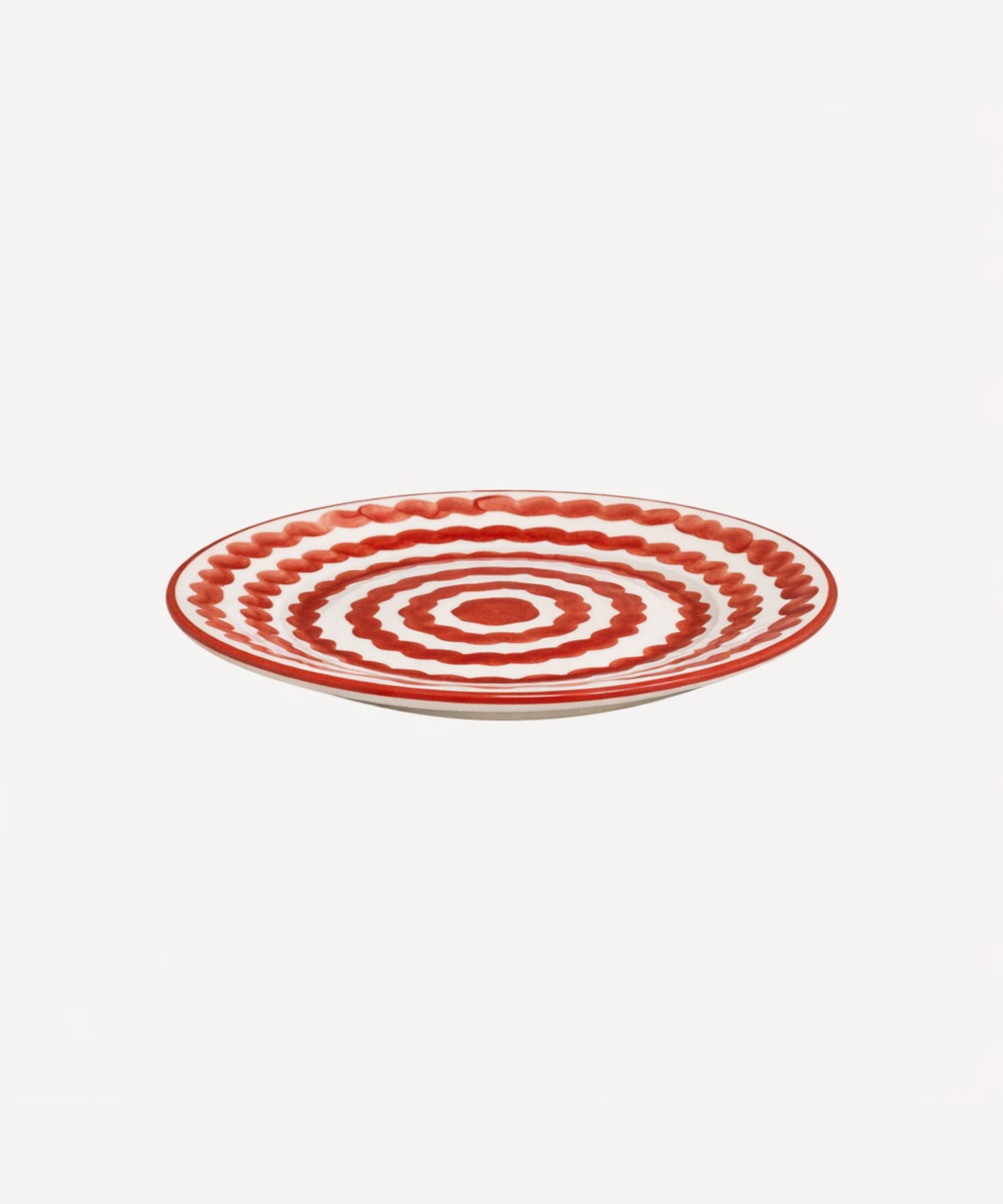 Ondas Side Plate in Rust Red, rippled ceramic — side profile