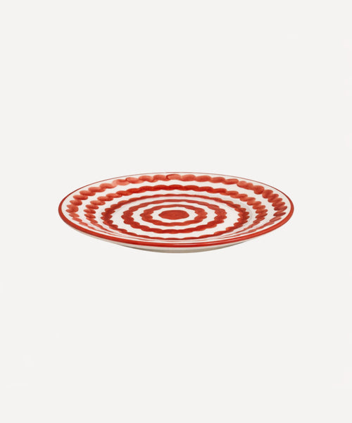 Ondas Side Plate in Rust Red, rippled ceramic — side profile