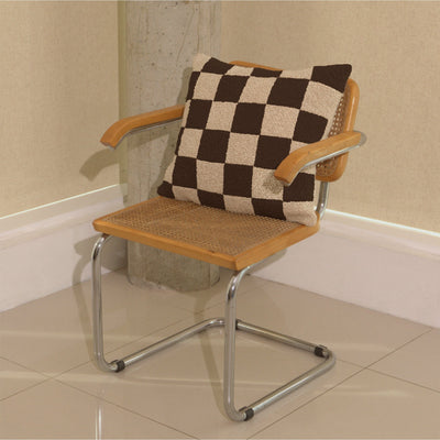 Cream and brown wool bouclé checkered square cushion on chair - handmade in UK