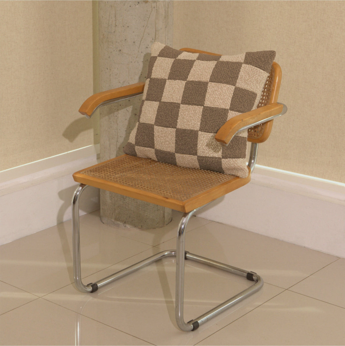 Cream and beige wool bouclé checkered square cushion on chair - handmade in UK