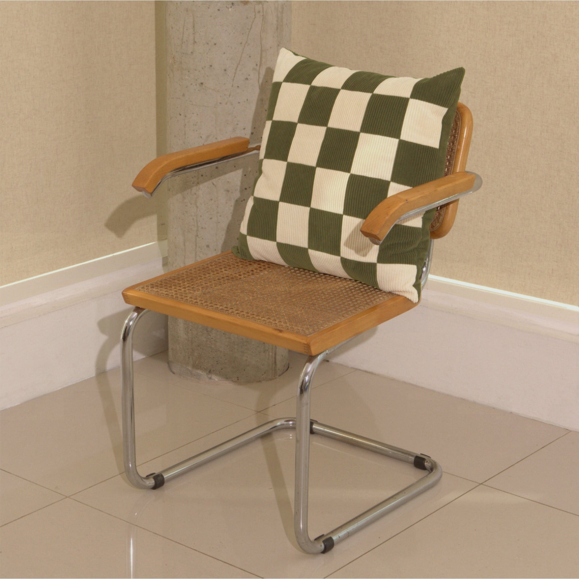 Cream and green cotton corduroy checkered square cushion on chair - handmade in UK