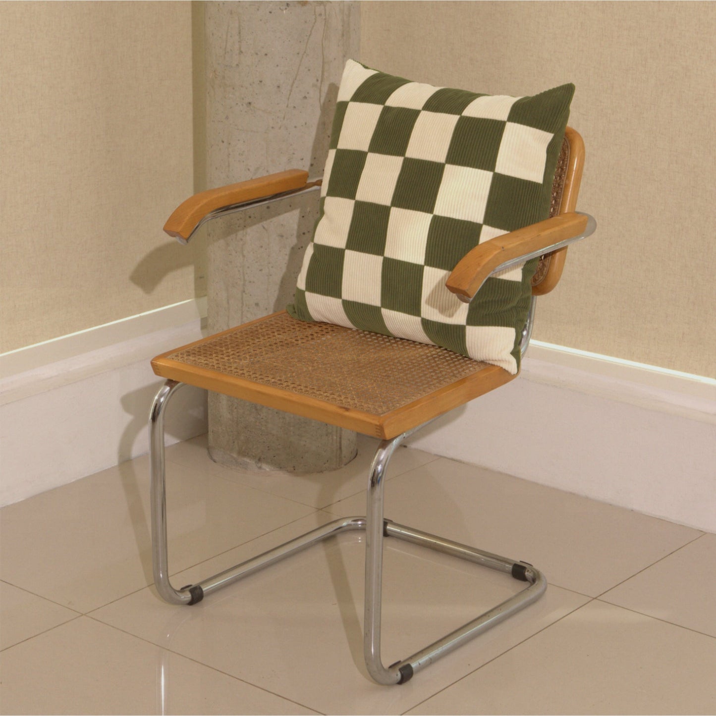 Cream and green cotton corduroy checkered square cushion on chair - handmade in UK