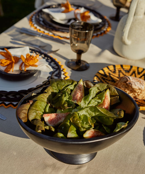 Chamba Oval Fruit Bowl detail — agate-polished natural black clay finish