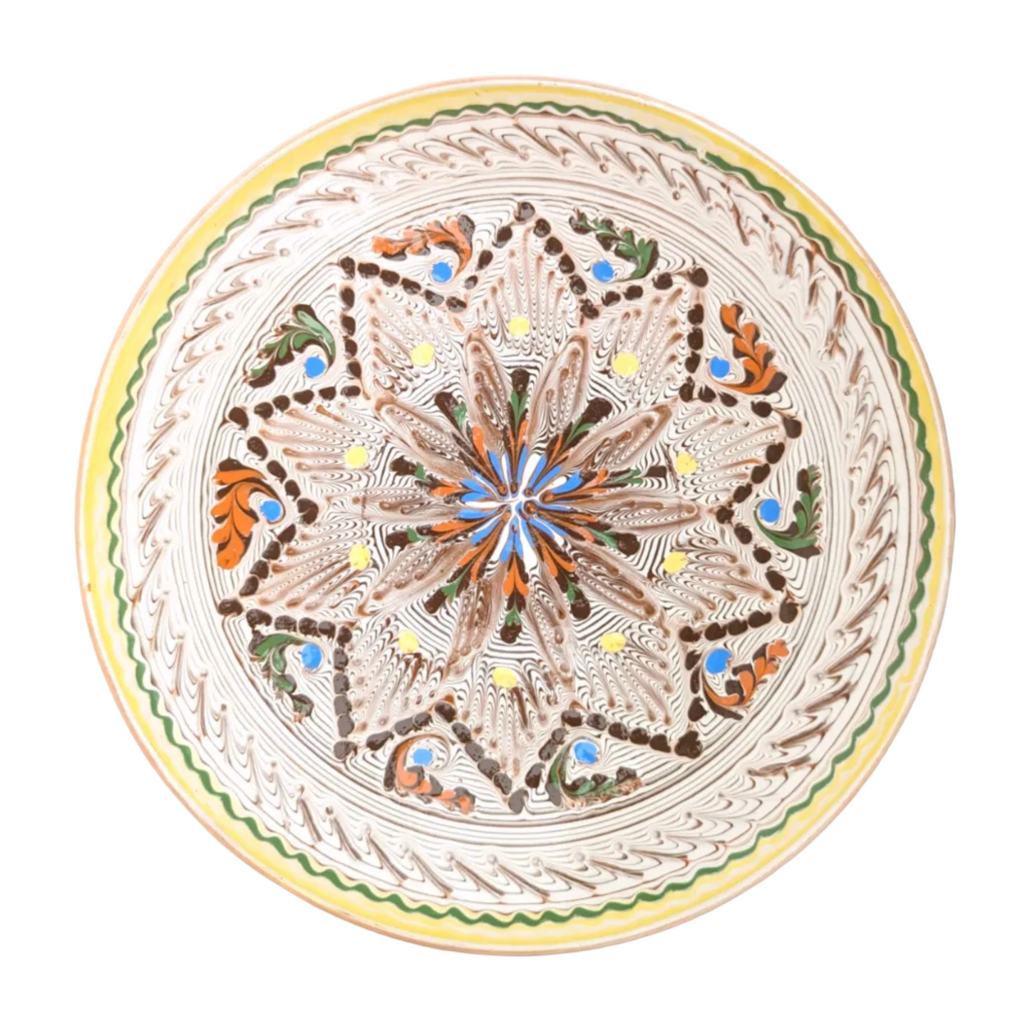 A large, handcrafted ceramic serving plate with a geometric and floral pattern, predominantly in ecrus and whites, with touches of other colors.