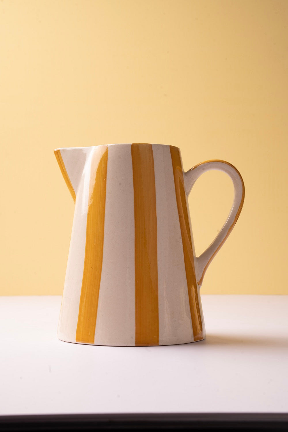 Ceramic Stripe Pitcher, Yellow- 8.25 x 8.25 x 8 Inches