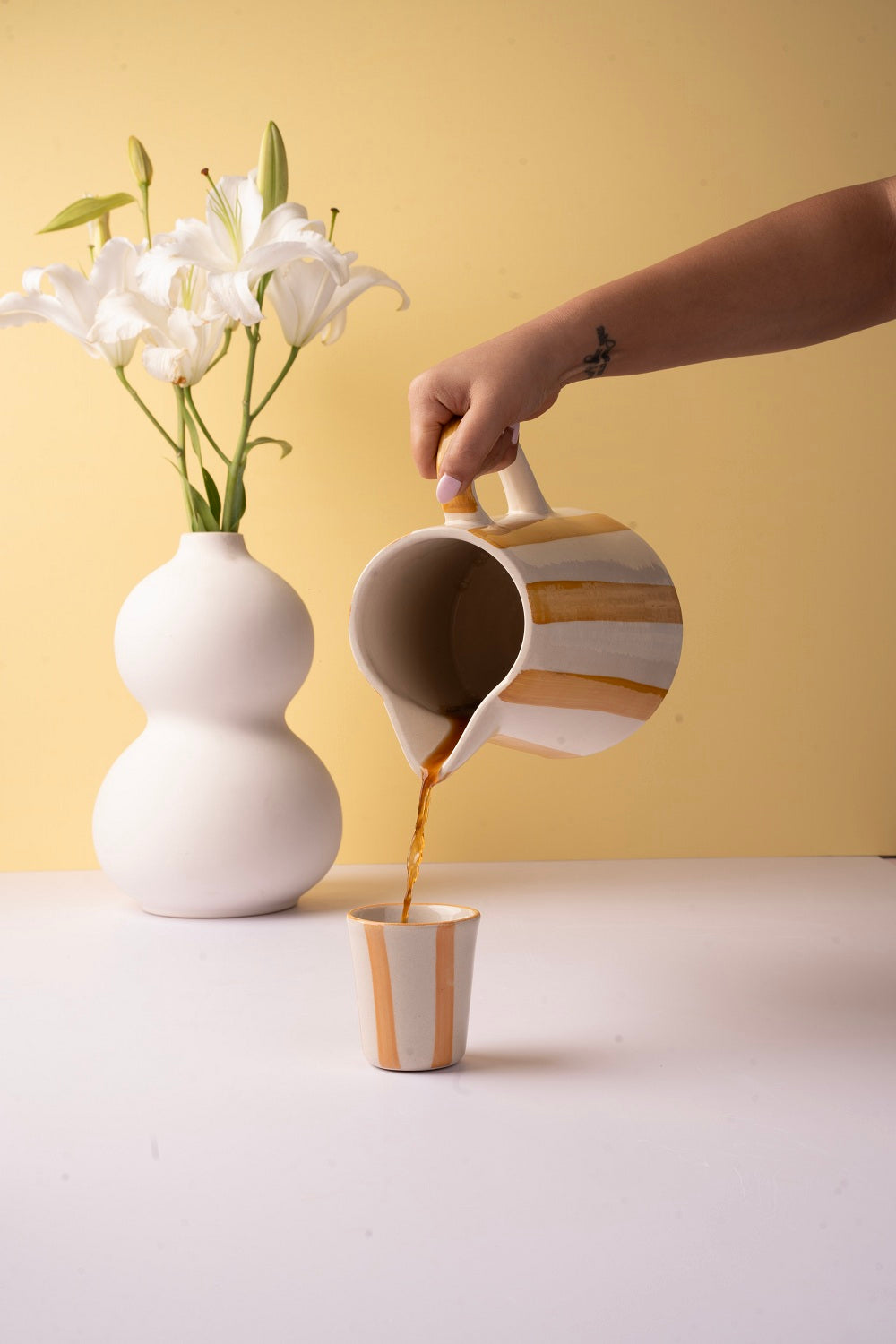Ceramic Stripe Pitcher, Yellow- 8.25 x 8.25 x 8 Inches