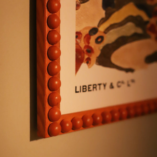 Burnt Orange Stained Bobbin Frame