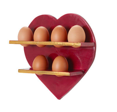 Heart-shaped egg holder with brown eggs in shelves on a white background