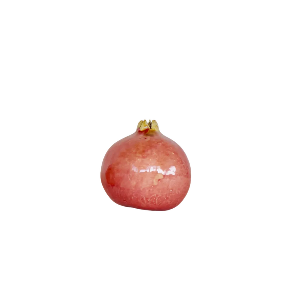 Handcrafted ceramic pomegranate ornament in red glaze by Marla Primrose – decorative artisan pottery for home or gift.