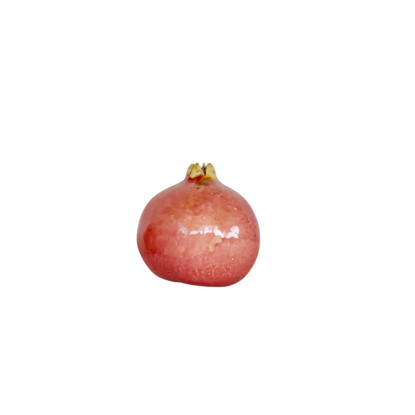 Handcrafted ceramic pomegranate ornament in red glaze by Marla Primrose – decorative artisan pottery for home or gift.
