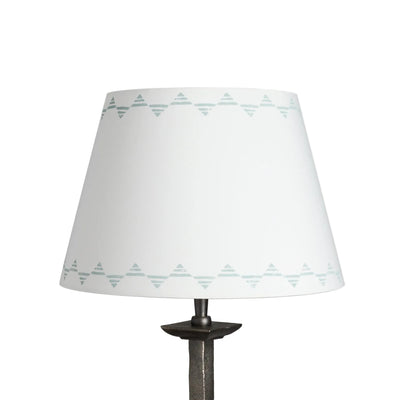 Empire lampshade in cream cotton with a blue triangle pattern, a geometric lampshade design shown on a plain white background.
