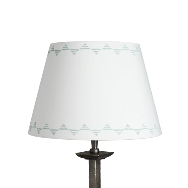 Empire lampshade in cream cotton with a blue triangle pattern, a geometric lampshade design shown on a plain white background.