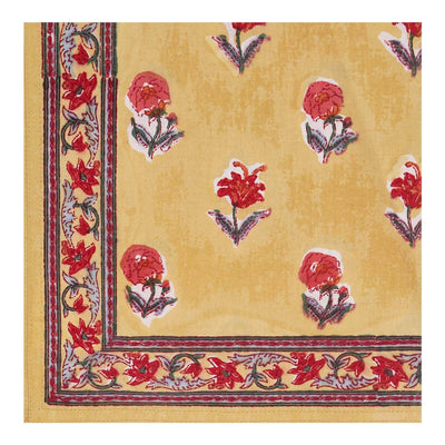 Block printed Haldi Table Napkin in a floral design in yellows and reds