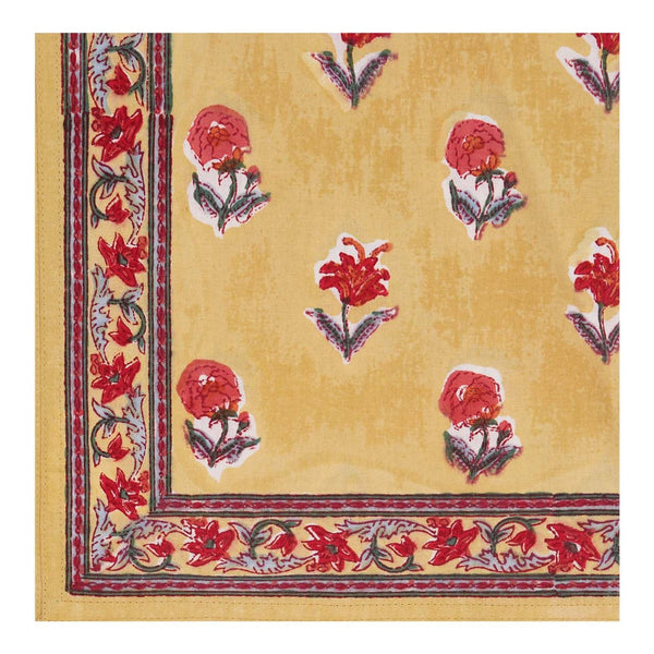 Block printed Haldi Table Napkin in a floral design in yellows and reds
