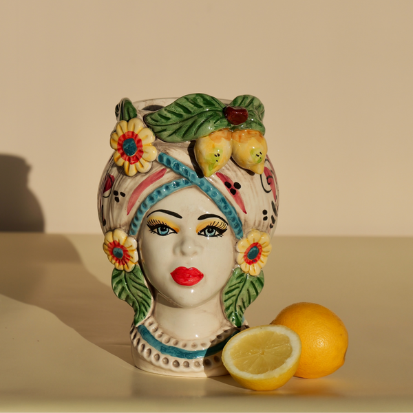 Handmade Sicilian female head vase with lemon and flower crown – ceramic Testa di Moro with Mediterranean detailing.