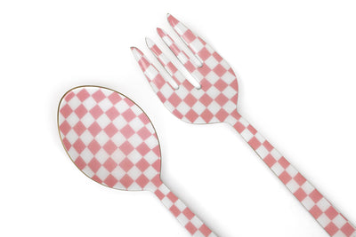 Checkered spoon and fork on a white background