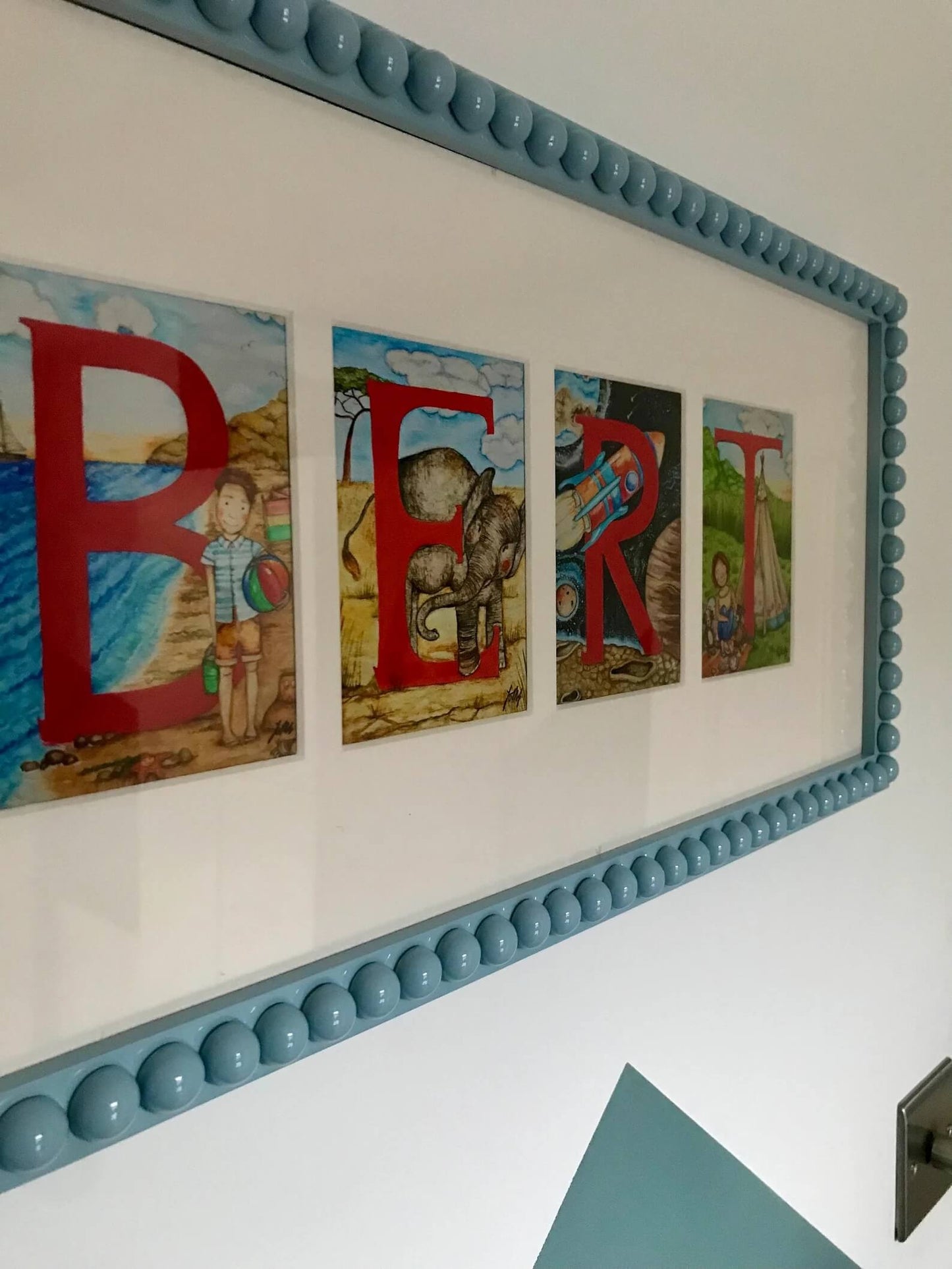Powder Blue Bobbin Frame on a wall