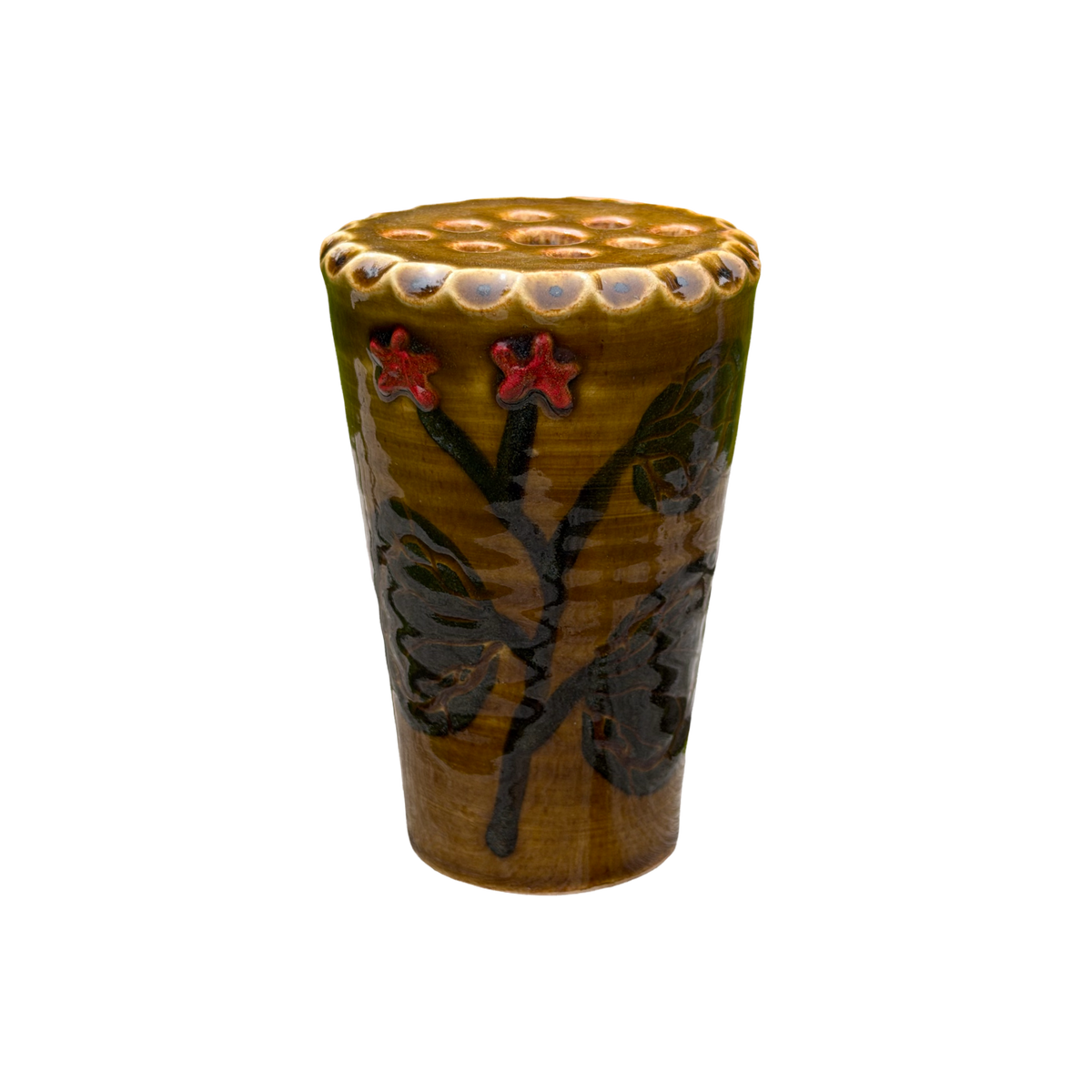 Ceramic cup with floral design on a white background