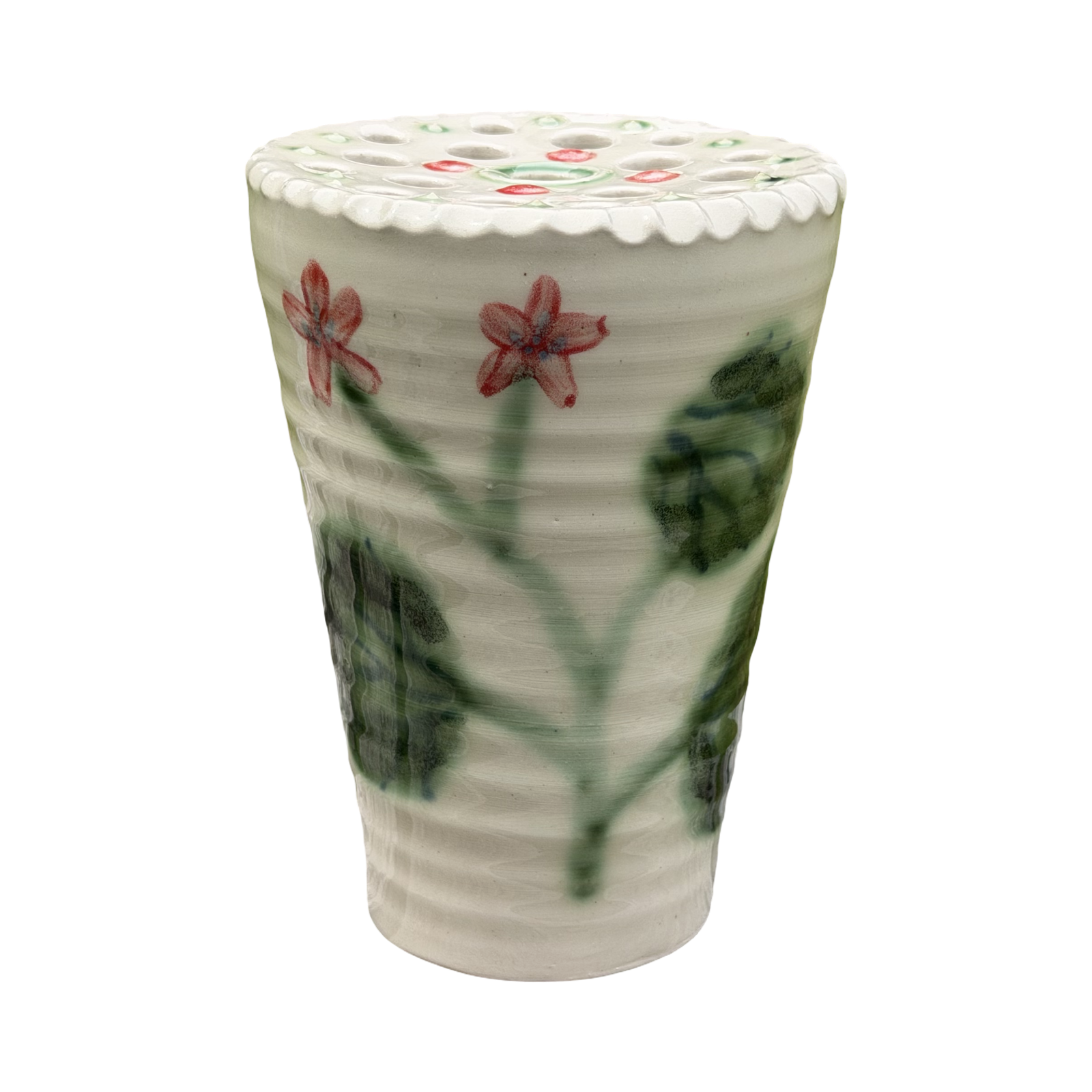 Ceramic vase with floral design on a white background