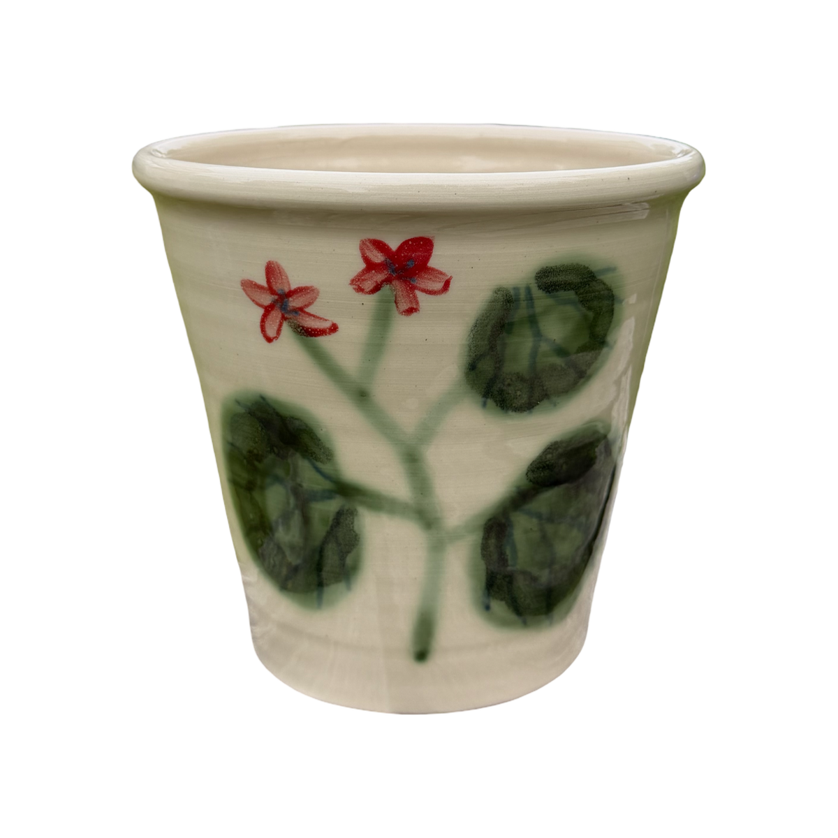 Ceramic pot with floral design on a white background