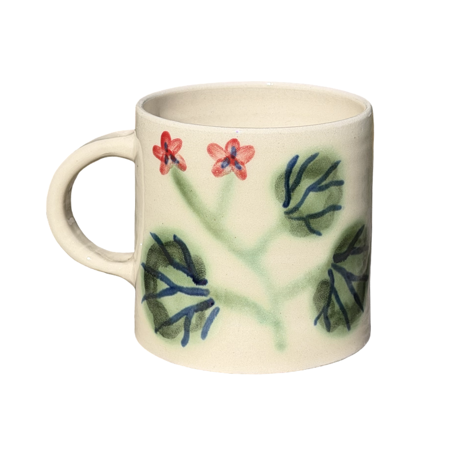 Ceramic mug with floral design on a white background