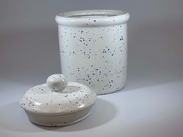 Light speckled blue canister