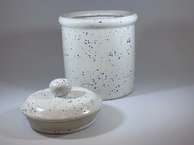 Light speckled blue canister